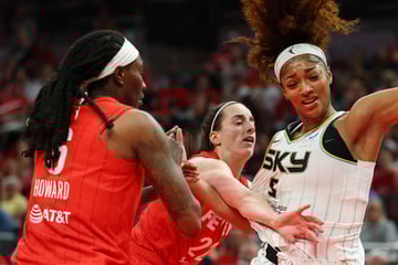 WNBA investigates "hateful" comments after clash between Caitlin Clark and Angel Reese