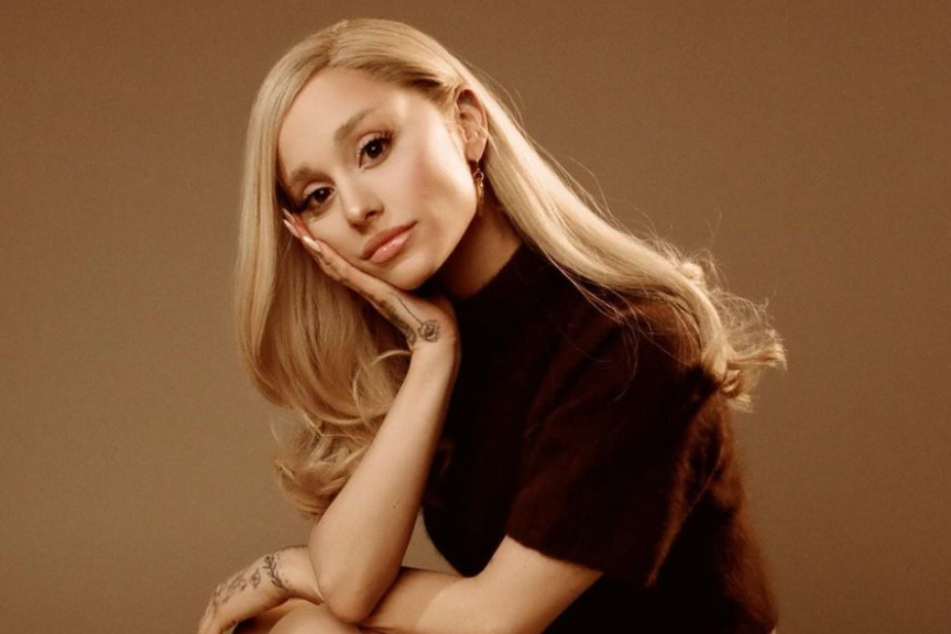 Ariana Grande is loving her newest r.e.m. beauty product. Check out what her favorite lip combo is!
